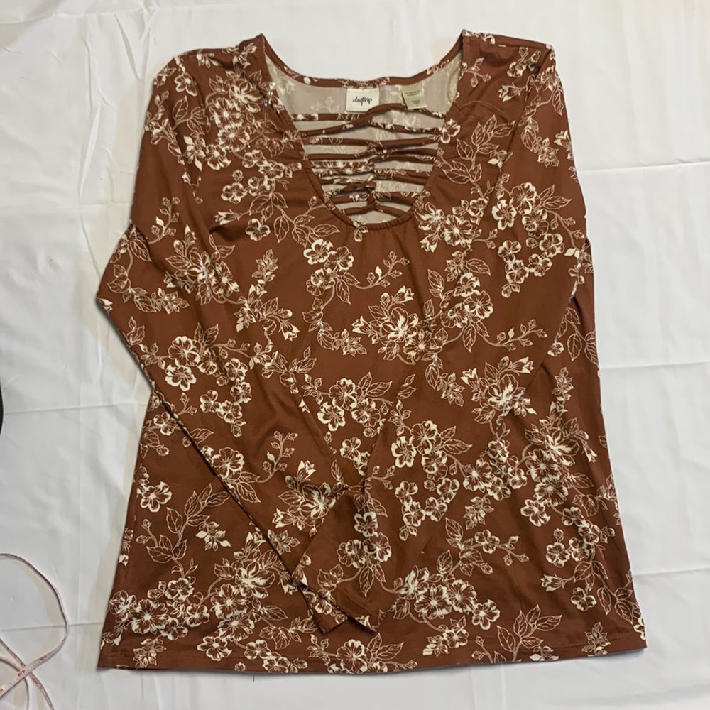 Womens Daytrip from buckle. Long sleeve with strappy neckline down to cleavage.